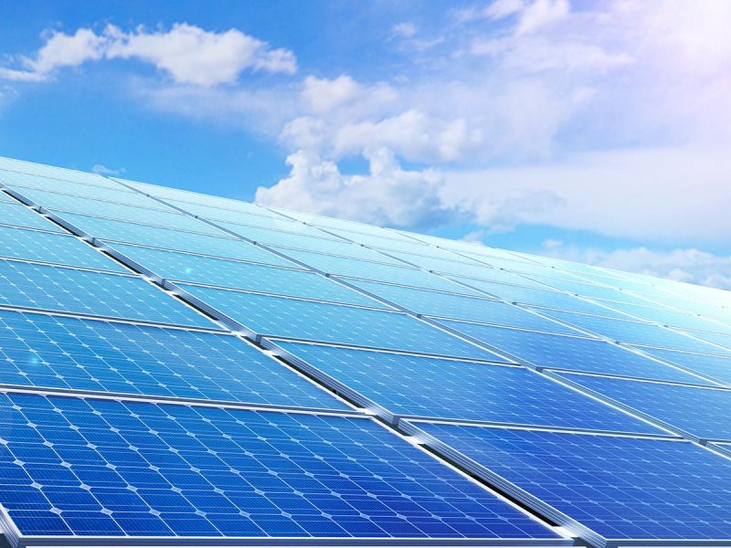 power solar panel on blue sky background,alternative clean green energy concept